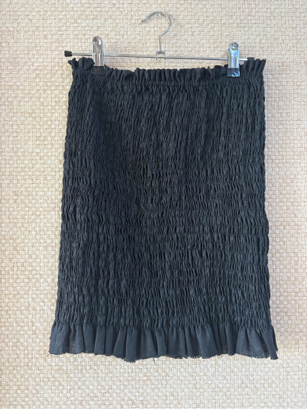 Black Smocked Mini Skirt with Ruffle Hem